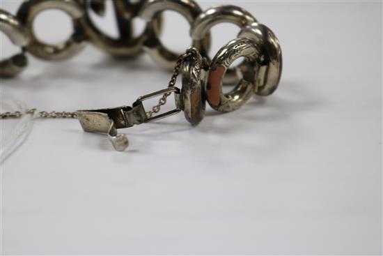 A late Victorian engraved silver and inset Scottish hardstone oval link bracelet.